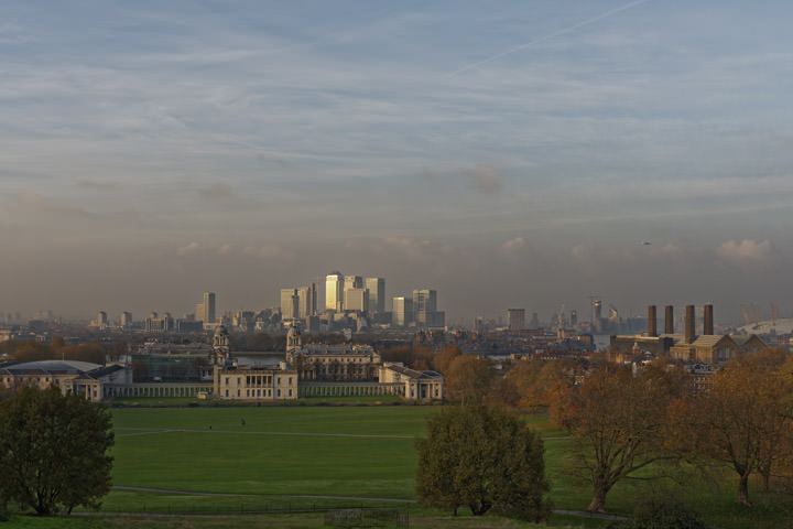 City Skyline from Greenwich and autumn trees of greenwich park.