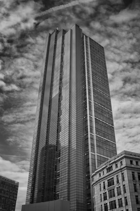 Heron Tower on a cloudy day in black and white.